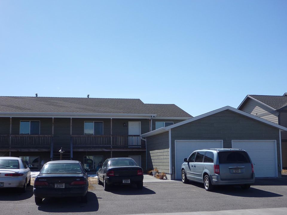 Single detached garage for each unit. Space for one more in front of garage.
