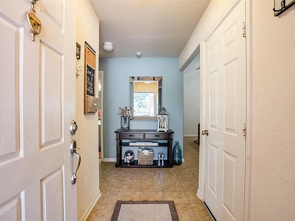 As you enter the home you are greeted with a neutral paint palette and nice flooring, which will make personalizing the space easy for you.