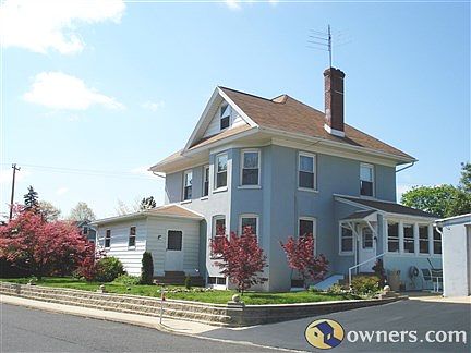 Downstairs bay window - living room, upstairs - master bedroom
