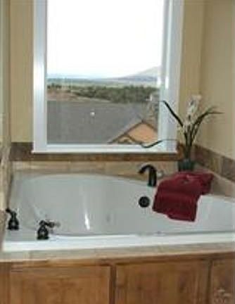 Relax in your jetted tub while taking in the view!