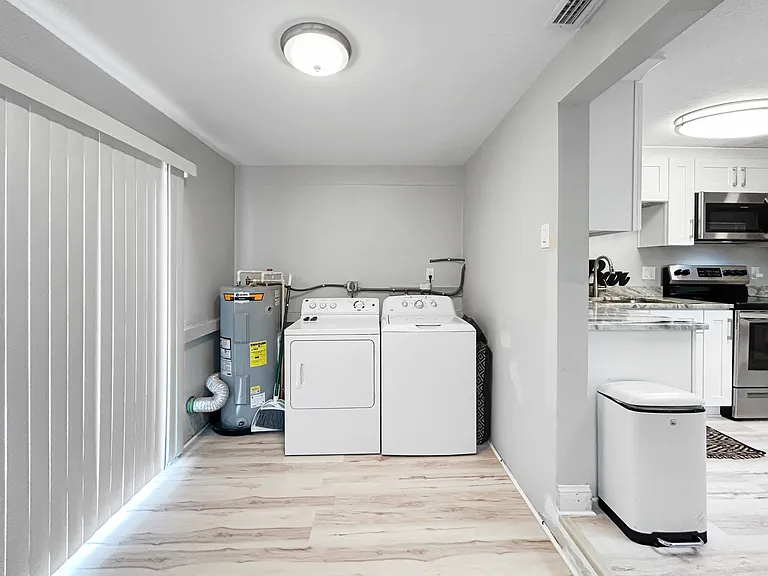 Laundry and utility area
Dedicated in home laundry space that is bright and practical for everyday living. Extra room helps keep the home organized and clutter free.