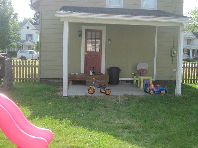 covered back porch, fenced yard