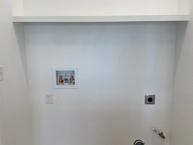 Laundry closet off kitchen (dryer can be gas or electric)