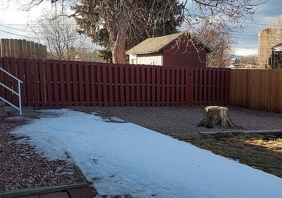 Backyard from man door of garage