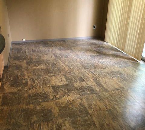 TV or office room next to kitchen. Slider door to front deck.