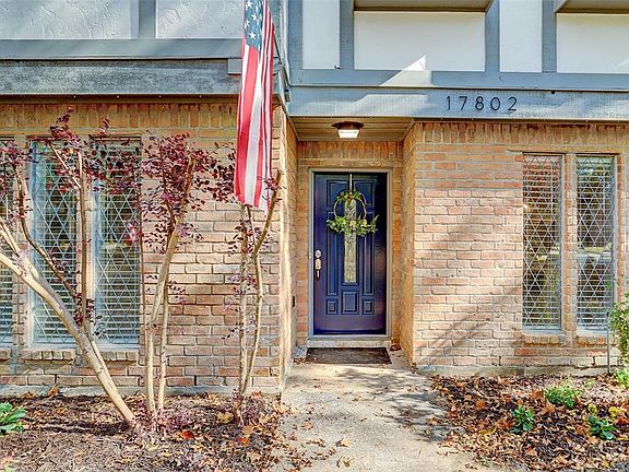 Newly painted deep blue front door w/new hardware, floral landscaping and fresh exterior and interior paint