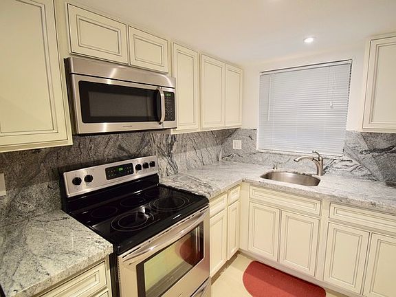 Updated kitchen with granite counter tops