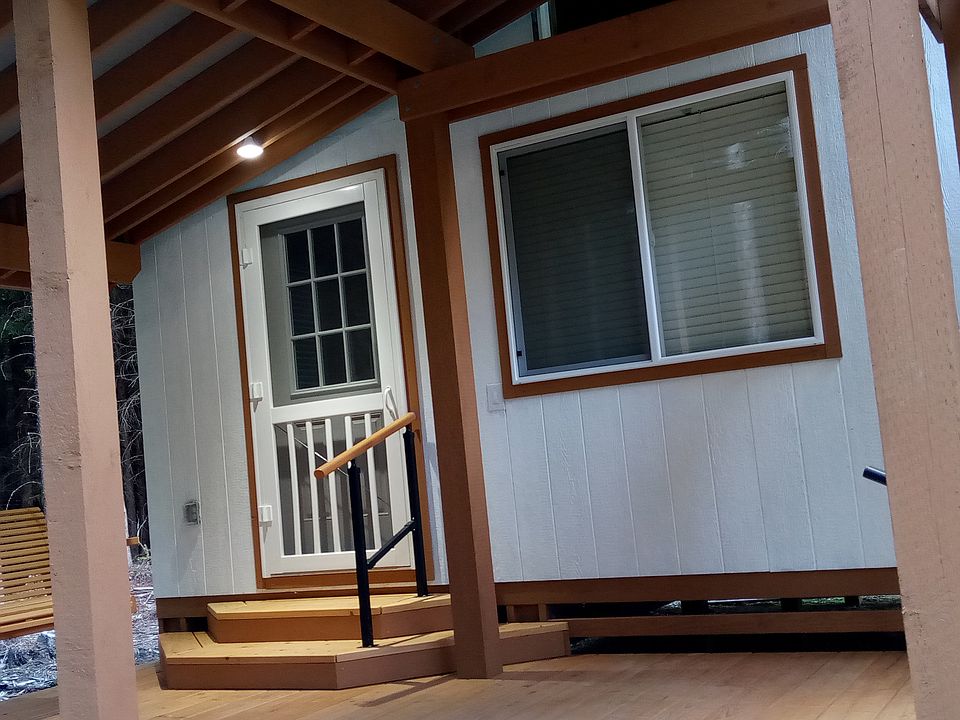 NOT an apartment, a private tiny home with covered porch with swing and private covered parking.