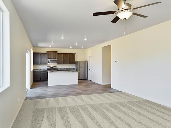 The open layout is highly sought after and has the kitchen open to the family room