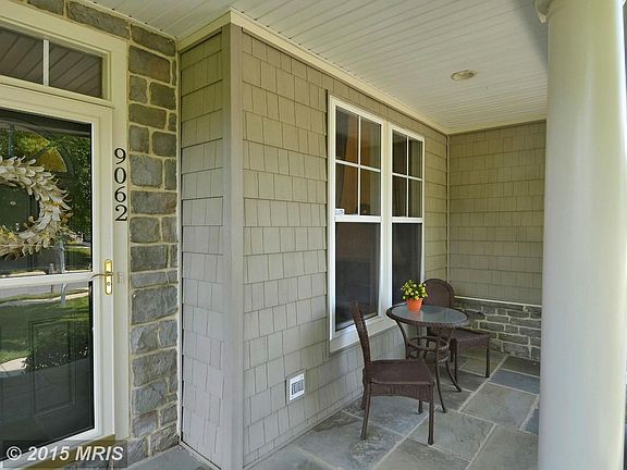 Say hello to neighbors from the lovely front porch