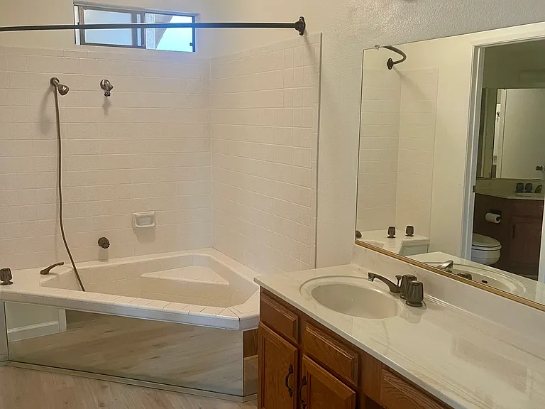 bathroom #2 has an adjoining Jack and Jill style bathroom which you can enter from the hallway as well as the bedroom #2.