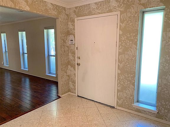 View of oversized front door in entry foyer.