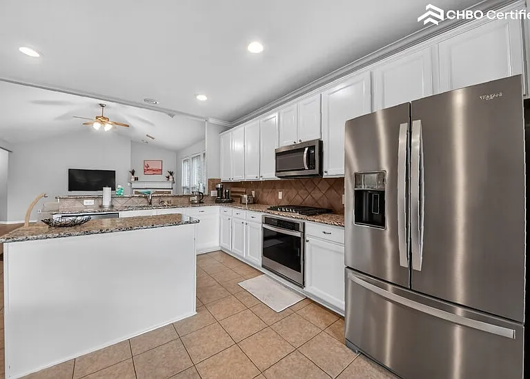 Kitchen includes updated appliances and Nespresso machine