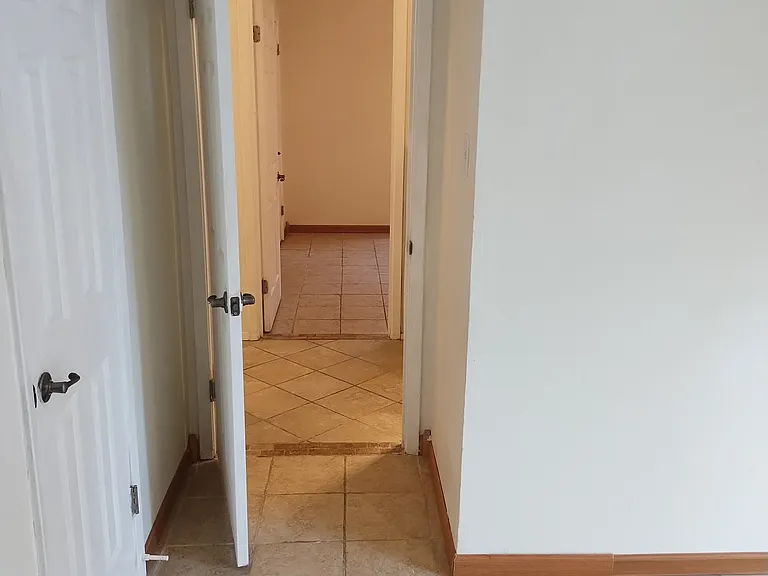 From Middle Bedroom looking through Hallway into Front Bedroom.