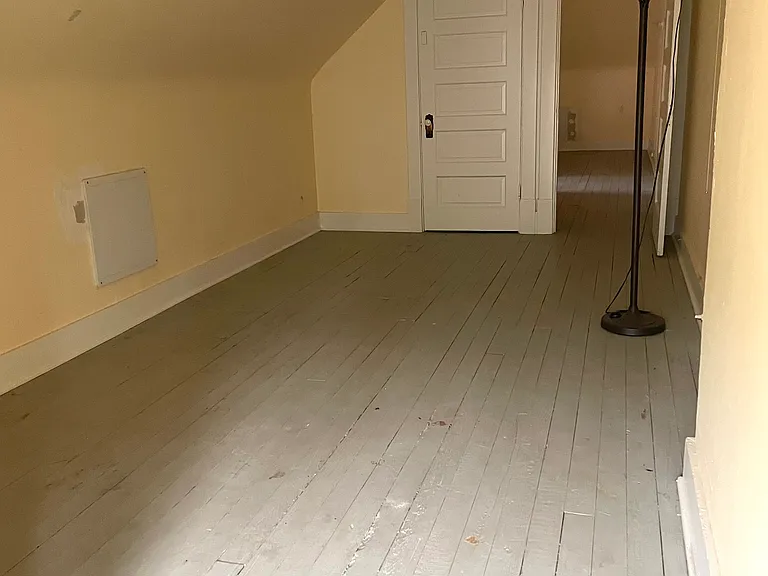 Hard to see but there is a large 2 room attic (unheated/no AC). Perfect for storage or daytime projects but not a living space. THere is also a full basement with a dehumidifier that is huge. Not a living space but perfect for more storage.