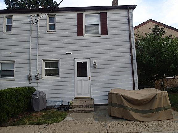 Back entrance with paver patio