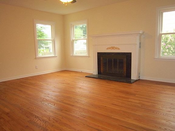 4TH BEDROOM 10 X 11, CAN BE DINING ROOM, HARDWOOD FLOORS, SINGLE CLOSET, CEILING FAN WITH LIGHT SLIDER TO DECK