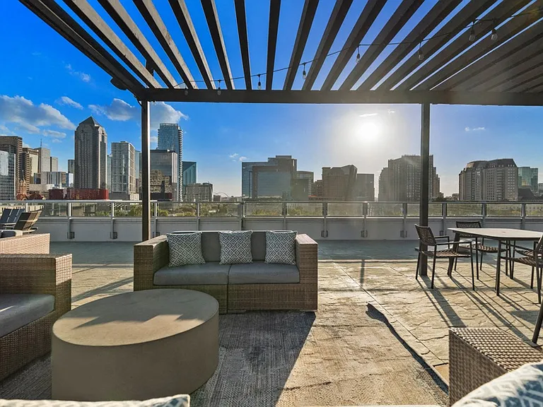 The rooftop terrace provides ample seating areas and BBQ grills