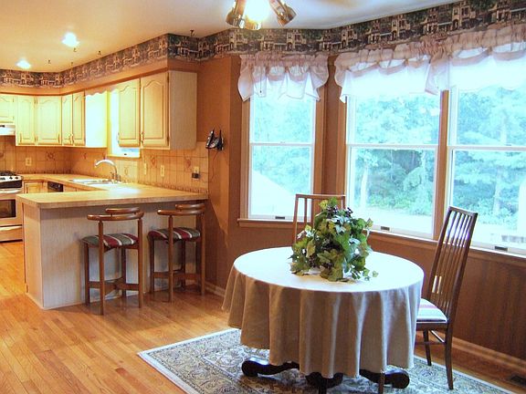 Eat In Kitchen Area with Bay Windows