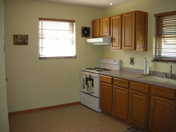 Completely new kitchen. All appliances stay. Tile floors solid surface counter