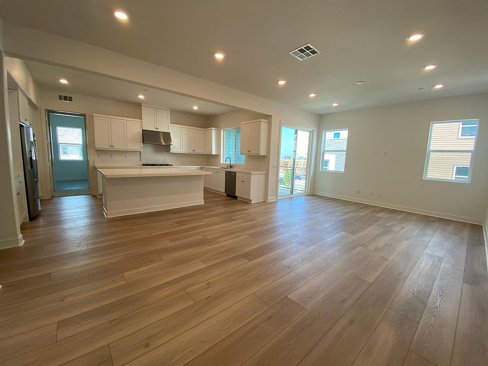 Brand new! Modern open floorplan - over 2,100 ft of living space with loft and 2 balconies