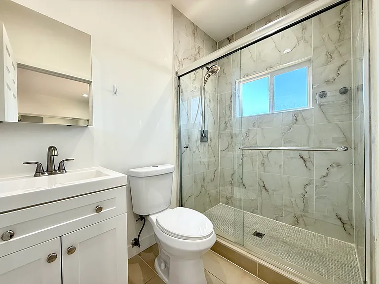 10723 Rhodesia Ave — Photo 14