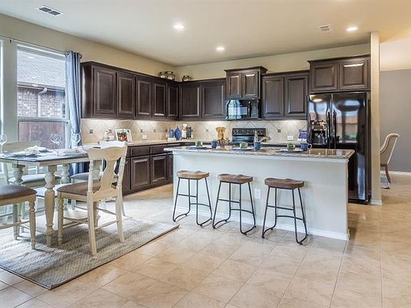 Photos shown here may not depict the specified home & features included are for illustration purposes only