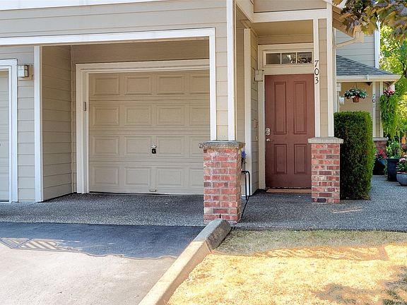 2nd image of 703 241st Lane SE #Q4