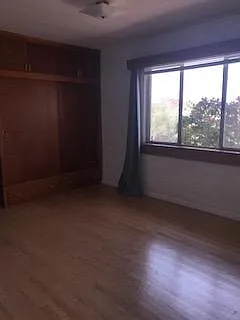 Bedroom facing west with mountain and sunset views