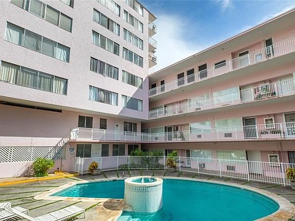 The courtyard offers a nice-sized pool to cool off in and plenty of room to lounge.