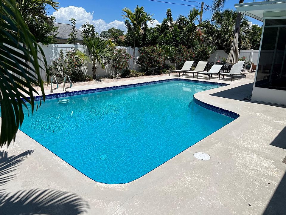 Beautiful inground pool and pool deck area