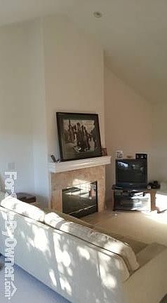 Fireplace : Fireplace is at center of room and 12 ft high cathedral ceiling.