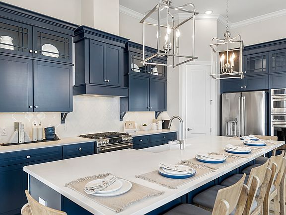 Glass upper cabinetry in kitchen