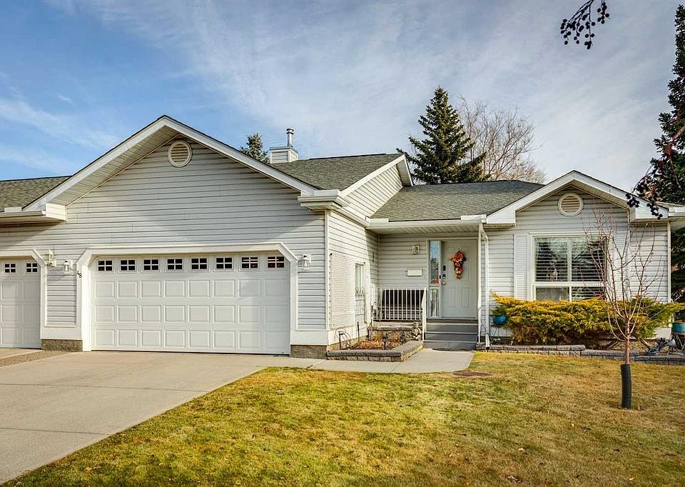 1st image of 48 W Deer Ridge Close SE