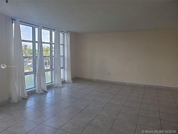 3rd image of 9800 W Bay Harbor Dr APT 402
