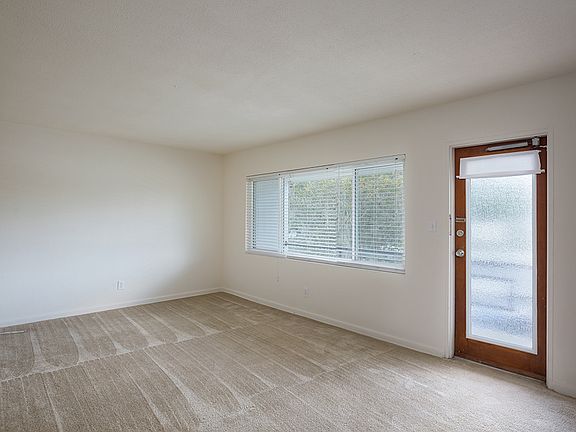 Another photo, energy efficient windows with plantation blinds!