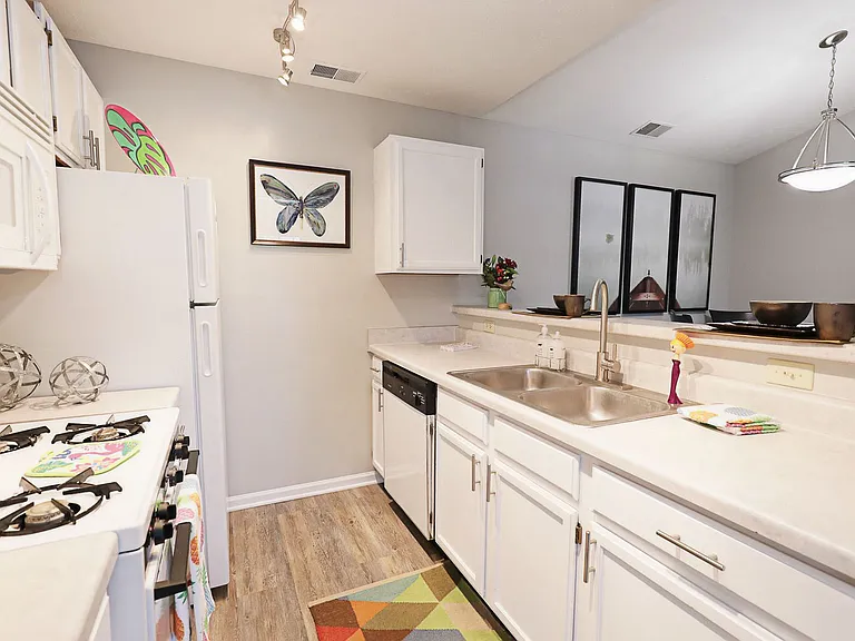 Spacious kitchen with modern appliances and ample counter space for cooking and entertaining.