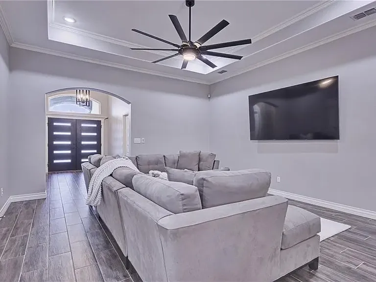 Inviting living room featuring an open-concept layout and abundant natural light.