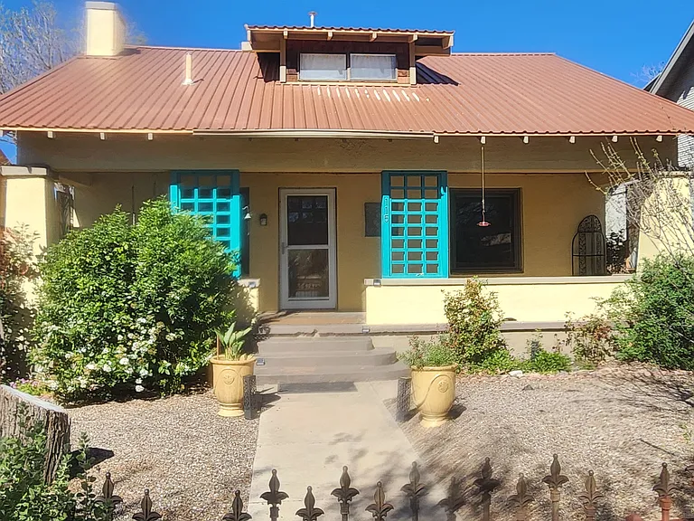 Front view of 115 W Vista, great front porch with swing
