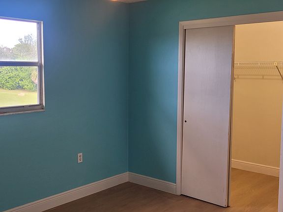 Bedroom with huge walk in closet