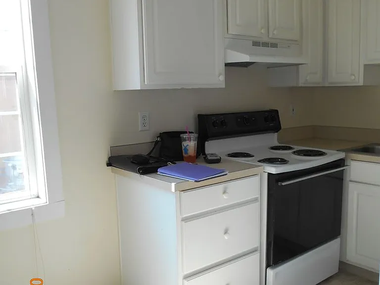 312-16 E 1st St — Photo 12