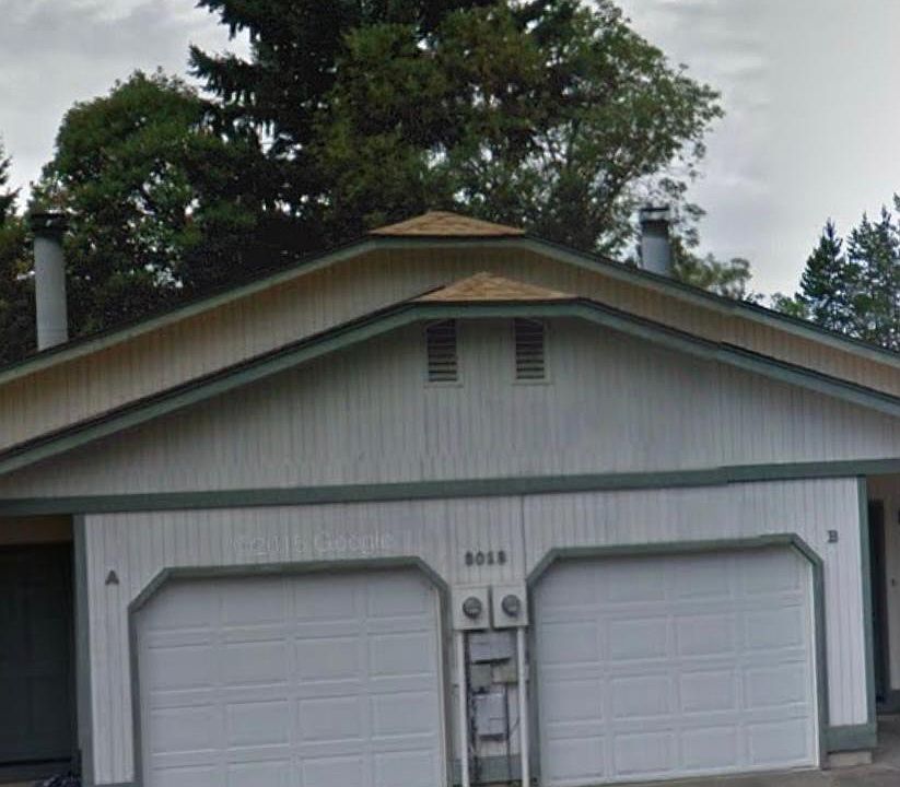 Duplex apartment with off street parking and 1 car garage