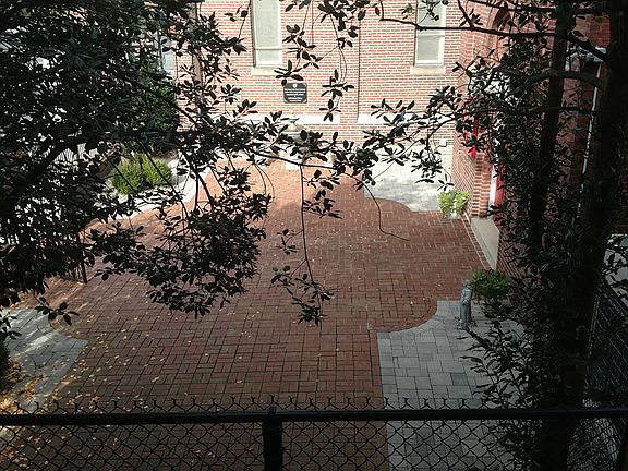 Galley Kitchen that overlooks downtown courtyard
