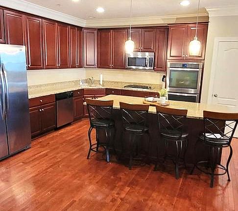 View of the spacious kitchen island.