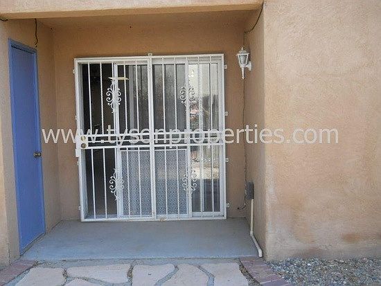 door to fenced in back yard