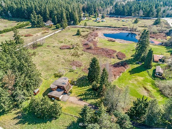 Property goes over to Martin Road & line follows along edge of rose hips like a large L shape