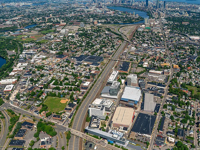 Explore this bustling urban landscape with its natural beauty and dynamic city life.