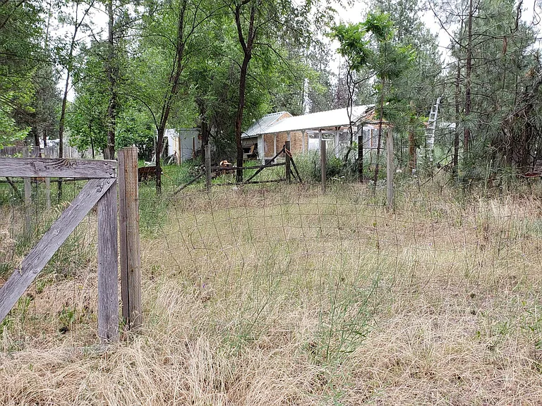 Fenced area ready for your garden of fruits and veggies.