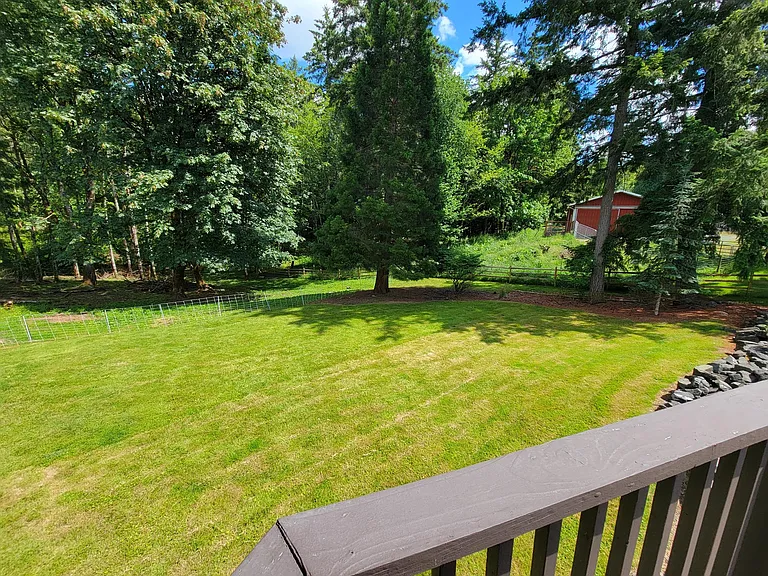 View of front lawn from front porch/summer.