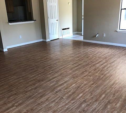 Living area looing to wards front door area.
